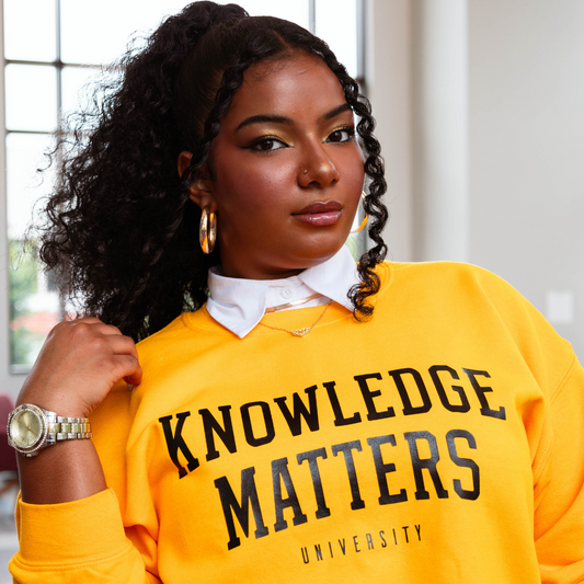 Knowledge Matters Gold Sweatshirt with (Black Print)